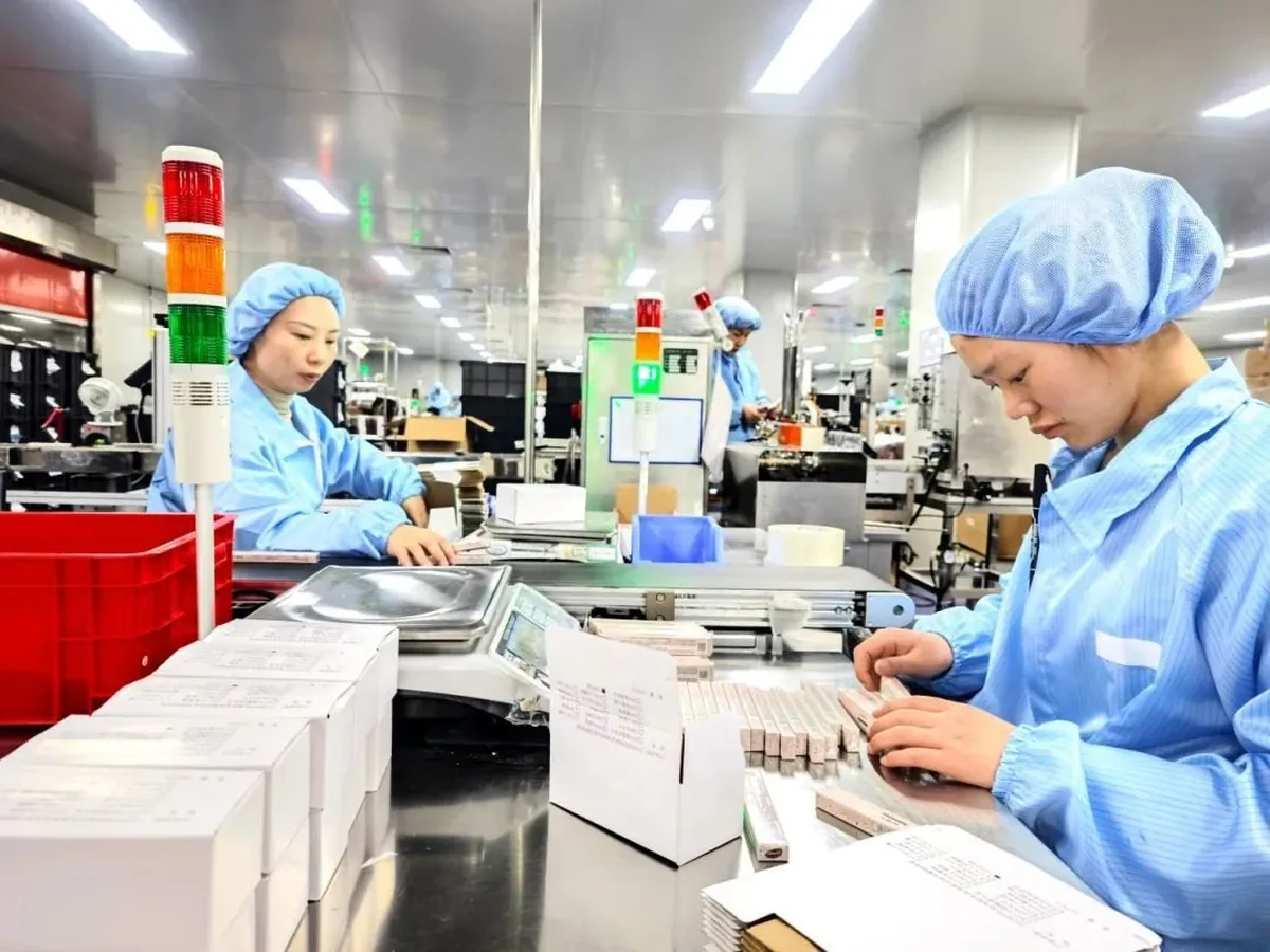 Secondary packaging hall at the VITALUME serum plant in Guangzhou